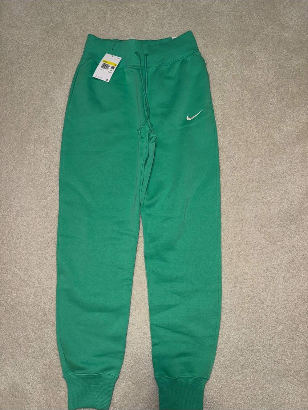 Nike Standard fit high rise Green Fleece Joggers with White Swoosh